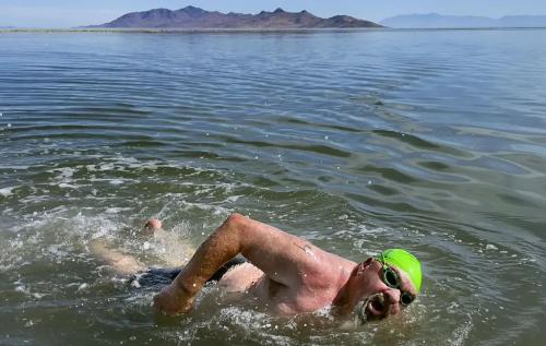 (Laura Seitz | Deseret News) Lane Henderson, of Riverton, competes in a 1-mile open swim competition at Great Salt Lake State Park in Magna on Saturday, June 11, 2022